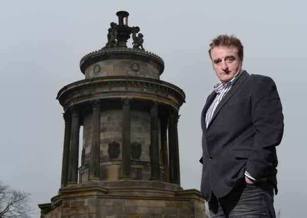 Tommy Sheppard stands beside the Robert Burns Monument on the edge of his Edinburgh East constituency. Picture: Neil Hanna