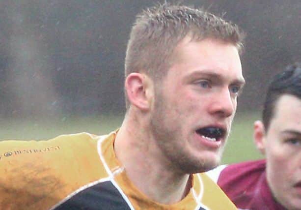 Currie's Cameron Gray grabbed his sides fourth try