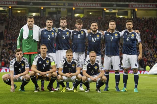 The Scotland starting XI line up prior to kick-off. Picture: SNS