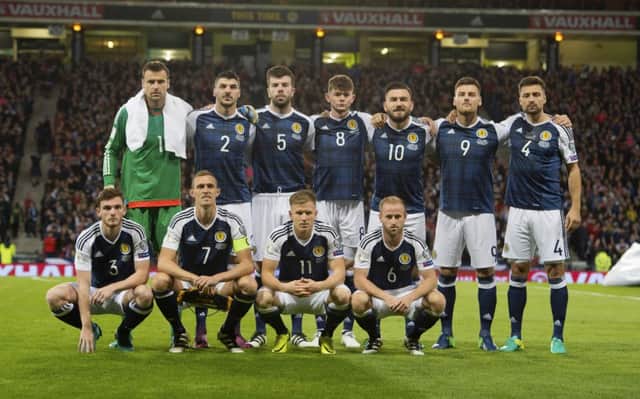 The Scotland starting XI line up prior to kick-off. Picture: SNS