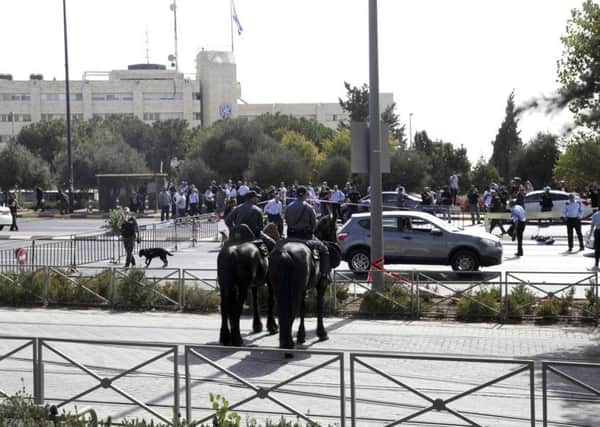 Israeli police secures the scene of a shooting attack in Jerusalem Picture; AP /Mahmoud Illean.