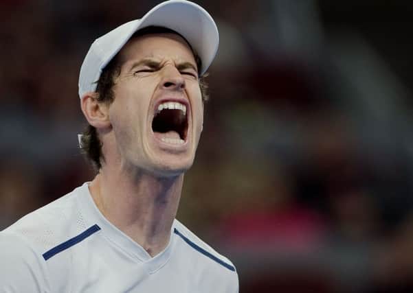 Andy Murray celebrates winning a point against Grigor Dimitrov of Bulgaria in the final of the China Open in Beijing. Picture: Nicolas Asfouri/AFP/Getty Images