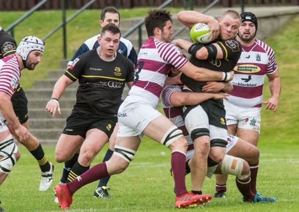 Watsonians' Matt Poole and Ruaridh Knott of Melrose in action. Picture: Ian Georgeson