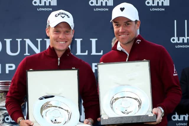 Danny Willett and Jonathan Smart celebrate after their team triumph in the Alfred Dunhill Links Championship. Picture: Getty Images