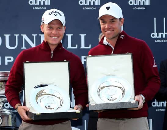 Danny Willett and Jonathan Smart celebrate after their team triumph in the Alfred Dunhill Links Championship. Picture: Getty Images