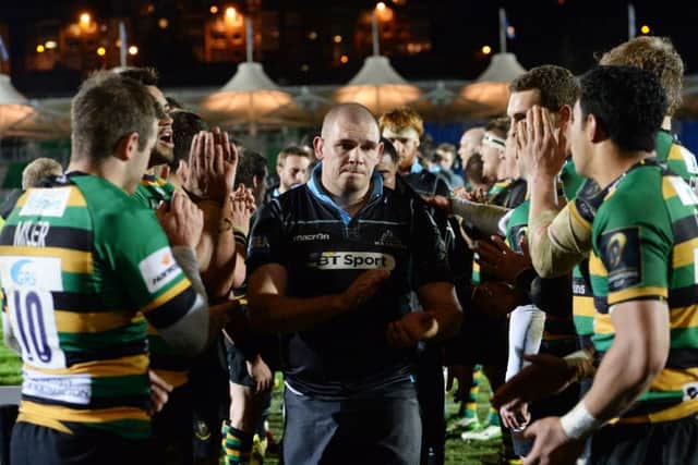 Prop Gordon Reid leads a dejected Glasgow side off the Scotstoun pitch after losing last seaons Euro opener to Northampton Saints. Picture: SNS
