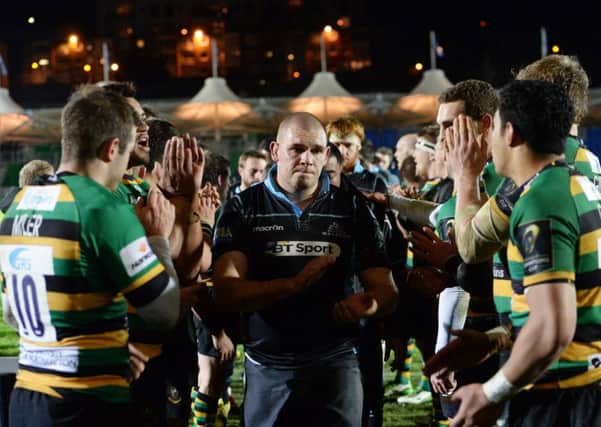 Prop Gordon Reid leads a dejected Glasgow side off the Scotstoun pitch after losing last seaons Euro opener to Northampton Saints. Picture: SNS