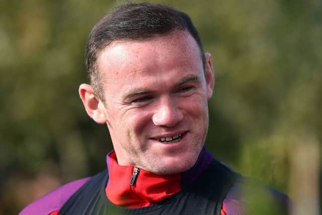Wayne Rooney has been dropped to the substitutes bench for England's meeting with Slovenia. Picture: AFP/Getty