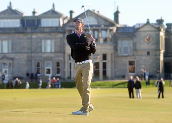 American Olympic legend Michael Phelps enjoys a round on the Old Course at St Andrews. Scottish golf businesses hope to attract more players from overseas. Picture: Jane Barlow/TSPL