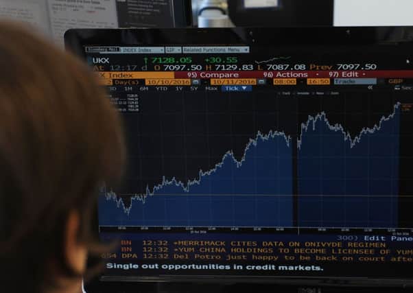 The FTSE 100 hit a record high today as the pound continued to fall. Picture: Benjamin Fathers/AFP/Getty Images