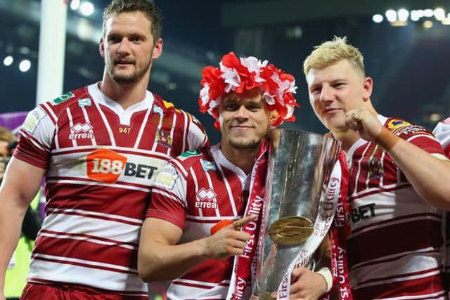 Lewis Tierney, centre, helped Wigan Warriors win the Super League Final at the weekend as is now in the Scotland rugby league squad for the Four Nations.  Picture: Alex Livesey/Getty Images