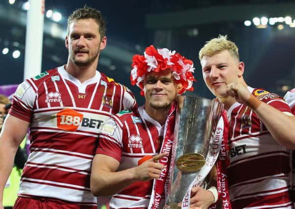 Lewis Tierney, centre, helped Wigan Warriors win the Super League Final at the weekend as is now in the Scotland rugby league squad for the Four Nations.  Picture: Alex Livesey/Getty Images