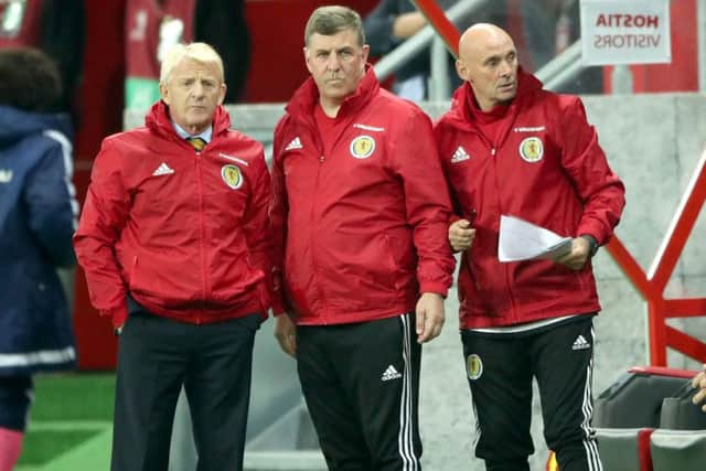 Scotland manager Gordon Strachan, left, watches on with coaches Mark McGhee and Andy Watson, right. Picture: Nick Potts/PA Wire