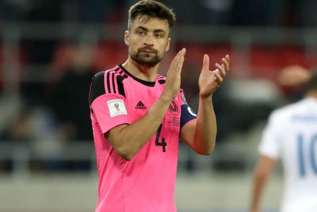 Scotland's Russell Martin applauds the fans after the 2018 FIFA World Cup qualifying match in Trnava. Picture: PA