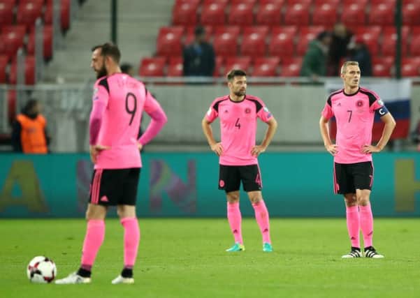 Scotland's players are devastated by their hosts Slovakia. Picture: PA