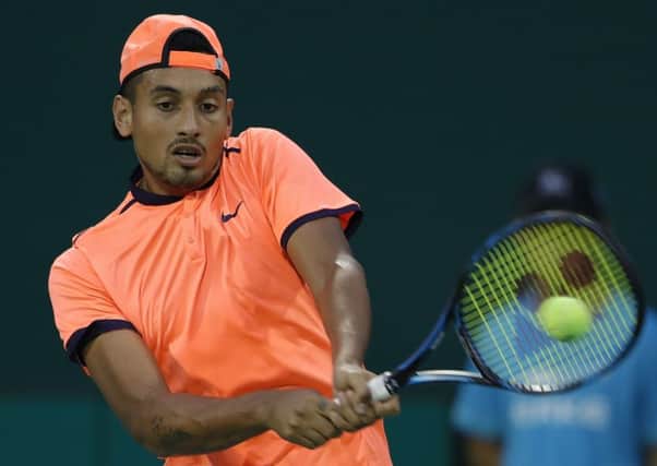 Nick Kyrgios of Australia returns a shot against Mischa Zverev of Germany during their turbulent clash at the Shanghai Rolex Masters.  Picture: Lintao Zhang/Getty Images