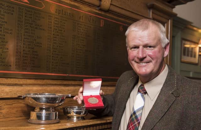 Sandy Lyle with his trophies after winning the World Hickory Open for a second time at Panmure. Picture: Andy Thompson Photography/ATIMAGES