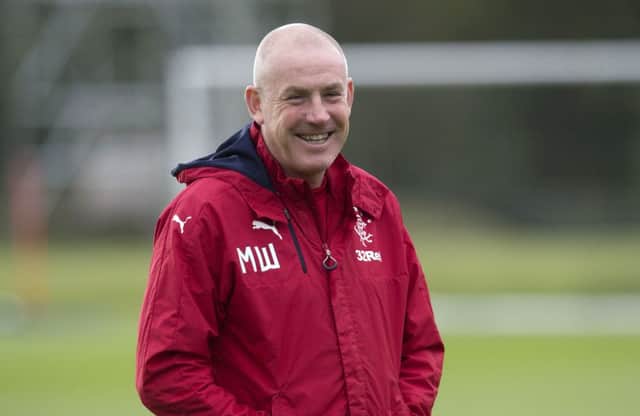 Mark Warburton was advised to leave the press conference by Jim Traynor. Picture: SNS