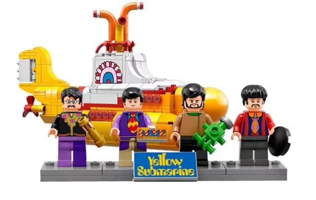 The new Lego set comes with four mini-Beatles as well as the eponymous submarine. Picture: Lego