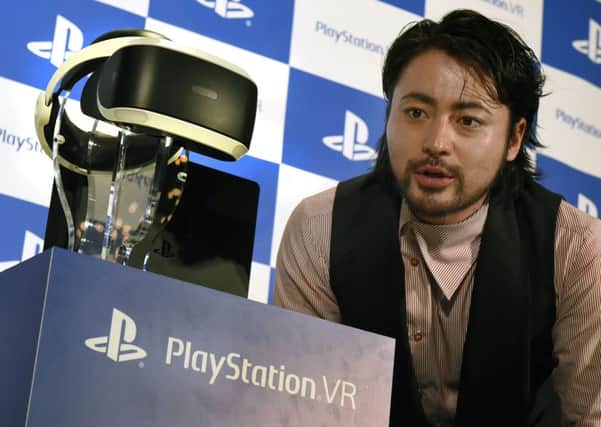 Game is hoping for a sales boost from new products such as Sony's PlayStation VR headset. Picture: Toru Yamanaka/AFP/Getty Images