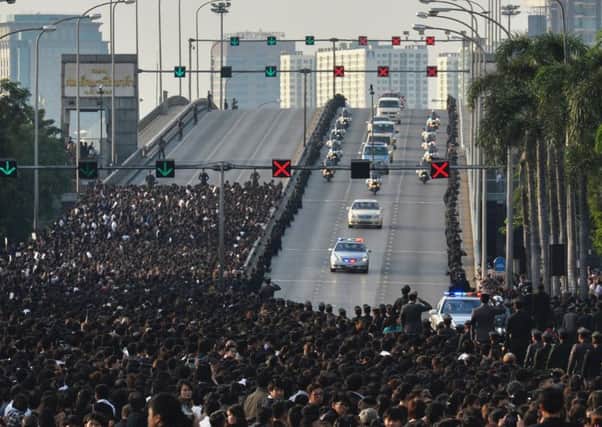 A van carries the body of Thai King Bhumibol Adulyadej's to his palace in Bangkok.
Picture: Getty Images