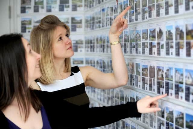 Would-be buyers browsing in Edinburgh face the problem that average house prices are 7.6 times average earnings. Picture: Jane Barlow