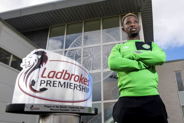 Celtic's Moussa Dembele with the Ladbrokes Premiership player of the month award for September. Picture: Craig Williamson/SNS