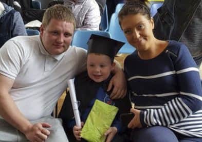 Lennon Toland with his parents. Picture: Submitted