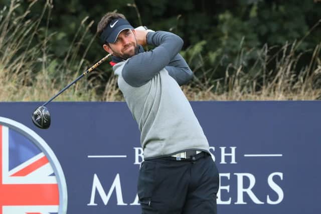 Scotland's Scott hits his tee shot on the ninth hole during the second round of the British Masters at The Grove. Photo Picture: Andrew Redington/Getty