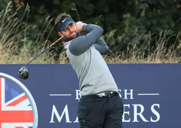 Scotland's  Scott hits his tee shot on the ninth hole during the second round of the British Masters at The Grove. Photo Picture: Andrew Redington/Getty