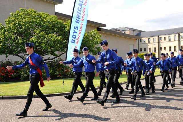 Members of 1st Tulliallan Boys' Brigade march past Tulliallan Police College to mark the company's 75th anniversary in May 2016. Picture: Roberto Cavieres/JP Resell
