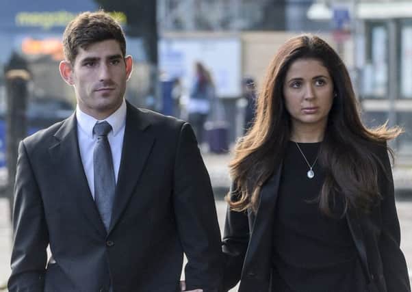 Footballer Ched Evans arrives at Cardiff Crown Court with his partner, Natasha Massey. Picture: Ben Birchall/PA