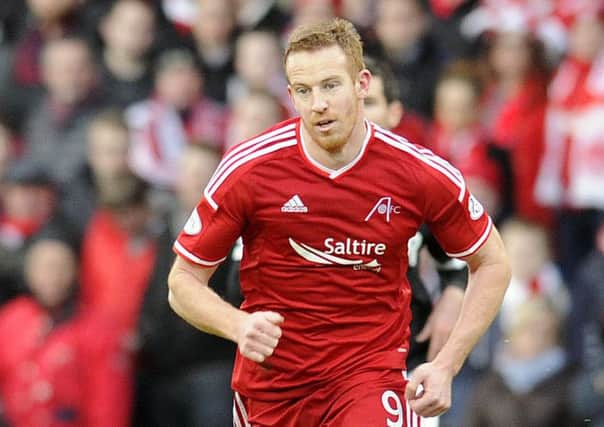 Aberdeen's Adam Rooney is pleased the club have bolstered their attacking options. Picture: John Devlin