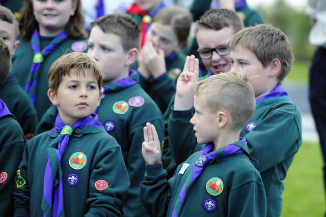 Cub Scouts from across the Falkirk district renew their promise  to mark the 100th anniversary of the section in September 2016. Picture: Michael Gillen/JP Resell