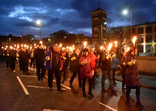 A torchlight procession marks the opening of the 2016 Royal National Mod in Stornoway. Picture: John MacLean/An Comunn