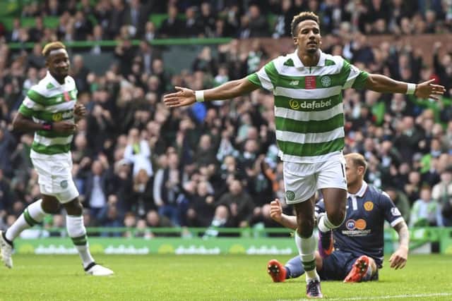 Celtic's Scott Sinclair celebrates opening the scoring with his seventh league goal in eight league appearances. Picture: SNS