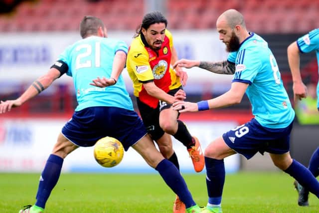 Partick Thistle's Ryan Edwards gets away from Hamilton's Massimo Donati and Georgio Sarris. Picture: Bill Murray/SNS