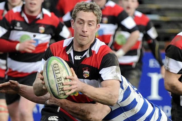 27/03/10, TSPL, Scotsman, Sport, Rugby Scottish Hydro Premier cup, Stirling County v Heriots,  Bridgehaugh, Stirling. Stirling's Jonnie Hope is tackled by Heriots Richard Mill. Pic Ian Rutherford