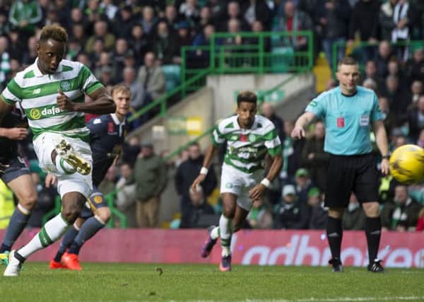 Celtic's Moussa Dembele scores his side's second goal from the penalty spot. Picture: Craig Foy/SNS