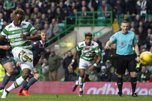 Celtic's Moussa Dembele scores his side's second goal from the penalty spot. Picture: Craig Foy/SNS