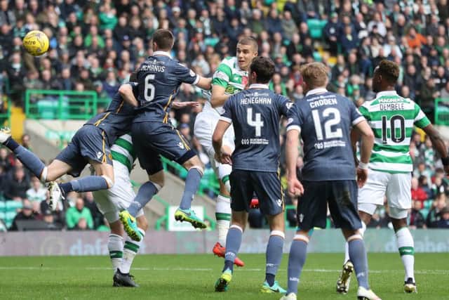 Jozo Simunovic heads towards goal during Celtic's 2-0 Premiership victory over Dundee. Picture: Ian MacNicol/Getty Images