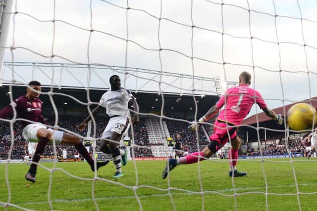 Bjorn Johnsen scores Hearts' second goal in their 2-0 win over Dundee. Picture: Rob Casey/SNS