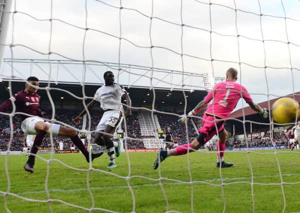 Bjorn Johnsen scores Hearts' second goal in their 2-0 win over Dundee. Picture: Rob Casey/SNS