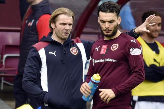 Hearts head coach Robbie Neilson's decision to remove Tony Watt left Hearts fans disgruntled. Picture: SNS