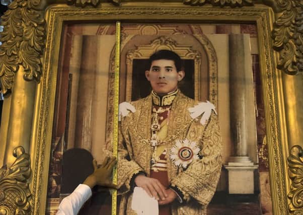 A portrait of Crown Prince Maha Vajiralongkorn, the heir to King Bhumibol Adulyadej. Picture: Getty