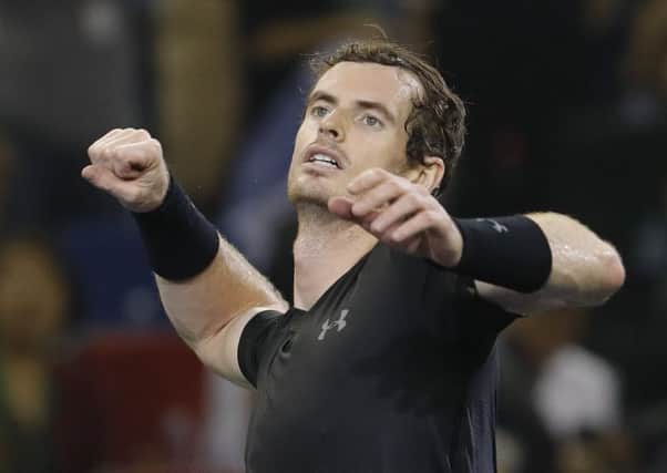 SHANGHAI, CHINA - OCTOBER 16:  Andy Murray of Great Britain celebrates after win over Roberto Bautista Agut of Spain during men's singles final match on day eight of Shanghai Rolex Masters at Qi Zhong Tennis Centre on October 16, 2016 in Shanghai, China.  (Photo by Lintao Zhang/Getty Images)