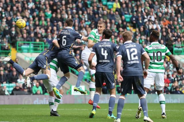 Jozo Simunovic, centre, in action against Motherwell on Saturday, says Celtic hold no fear of Monchengladbach. Picture: Getty.