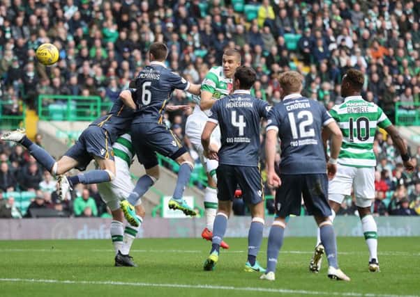 Jozo Simunovic, centre, in action against Motherwell on Saturday, says Celtic hold no fear of Monchengladbach. Picture: Getty.