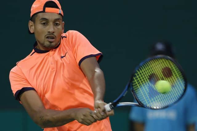 Nick Kyrgios was fined and banned for his behaviour in this match against Mischa Zverev in Shanghai. Picture: Lintao Zhang/Getty