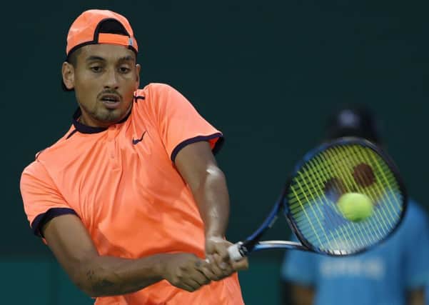 Nick Kyrgios was fined and banned for his behaviour in this match against Mischa Zverev in Shanghai. Picture: Lintao Zhang/Getty